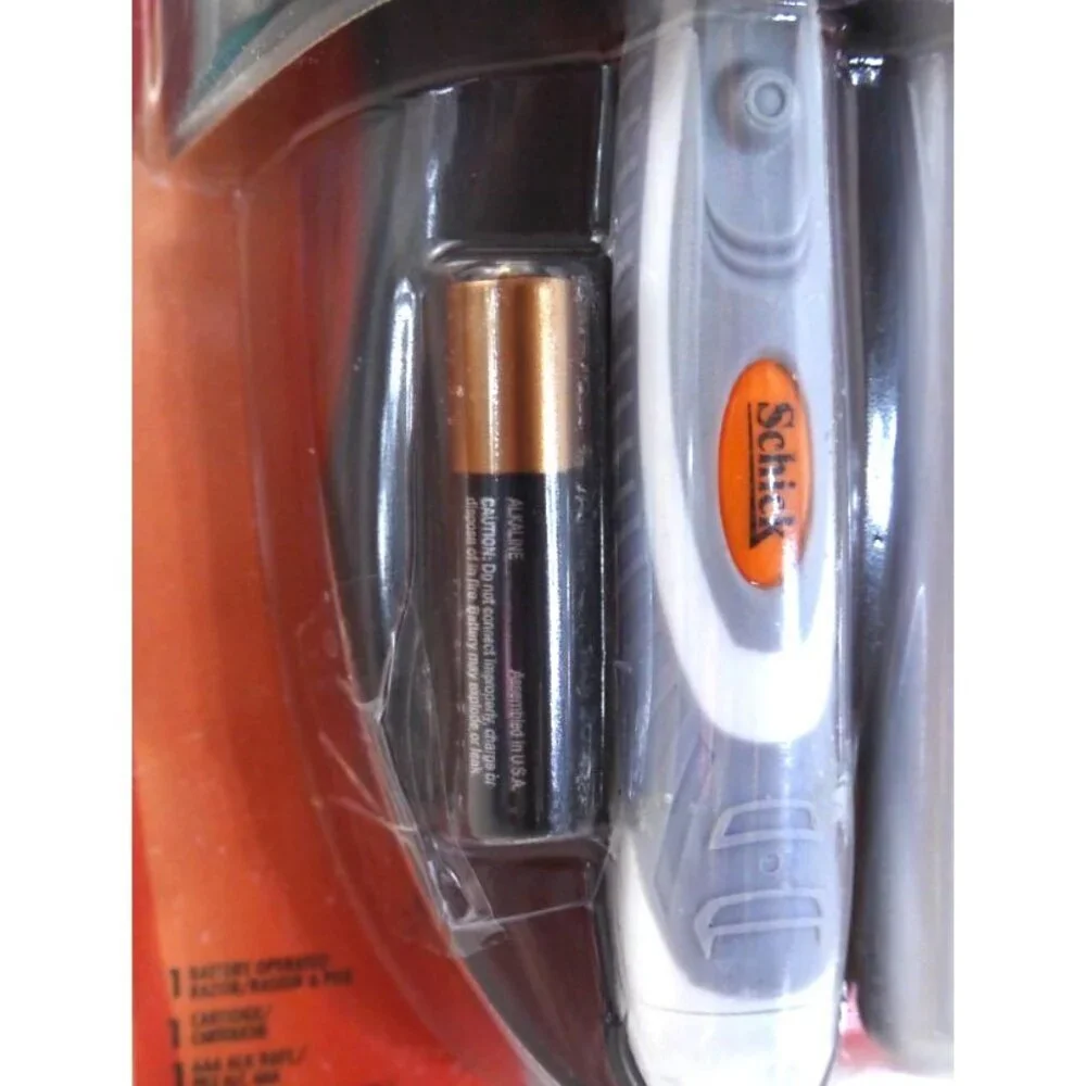 Vintage SCHICK Quattro Power with trimmer 2006 battery new, package damaged